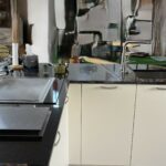 ilot granit Zimbabwe avec Teppaniaky et friteuse